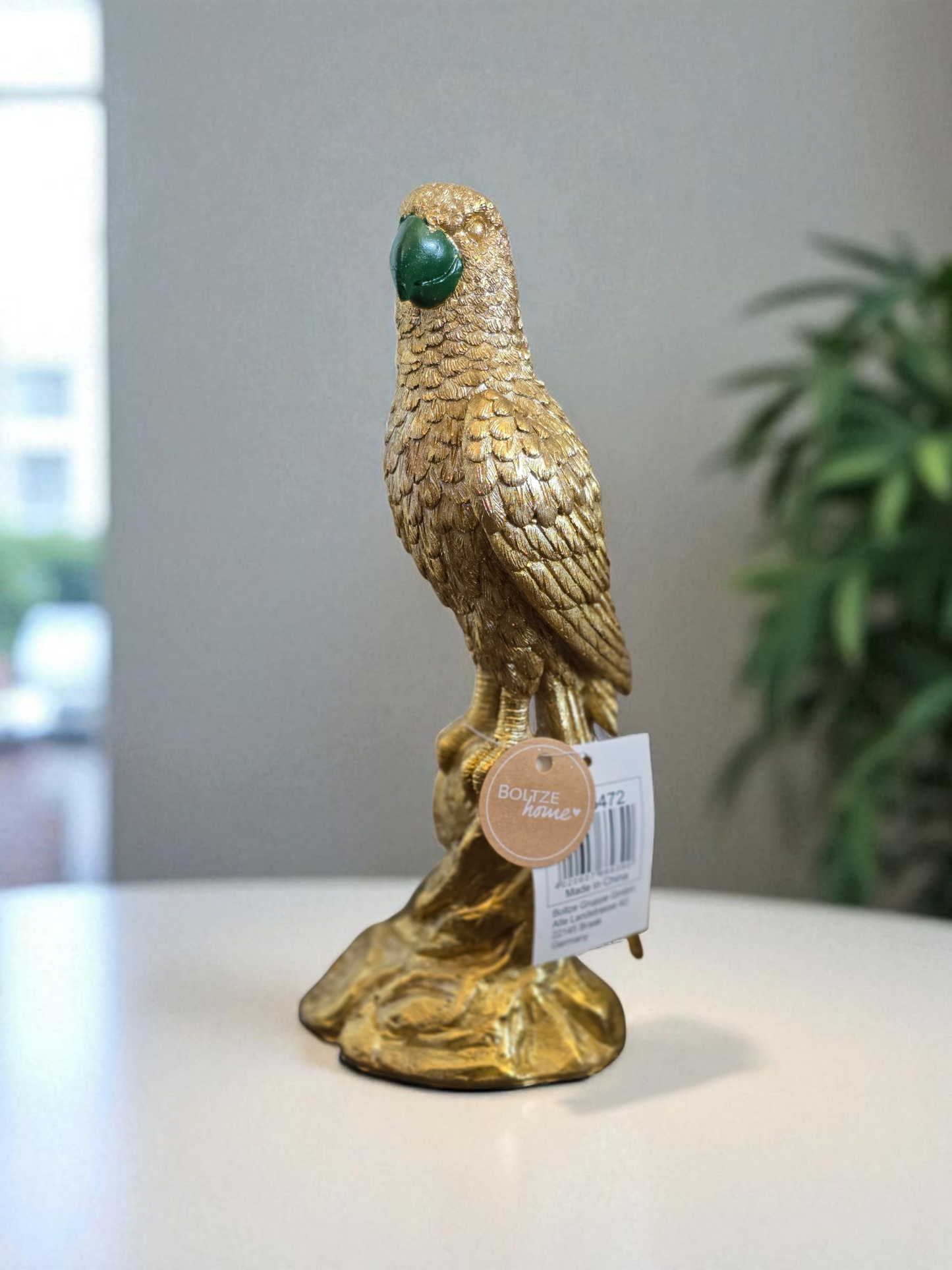 Papegøye i gullfarget resin. 24 cm